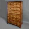 An early 18th century george ii period walnut chest on chest