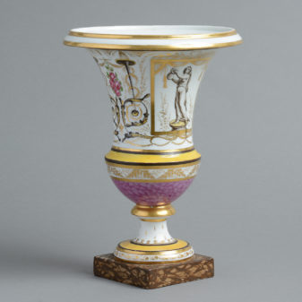 An early 19th century paris porcelain trumpet vase