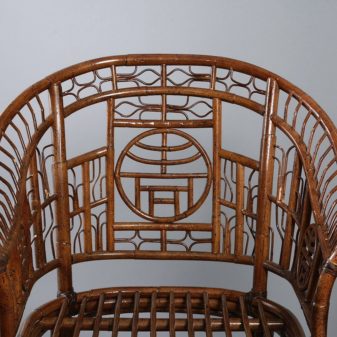 A pair of bamboo armchairs