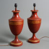 A pair of 20th century red tole vase lamp bases