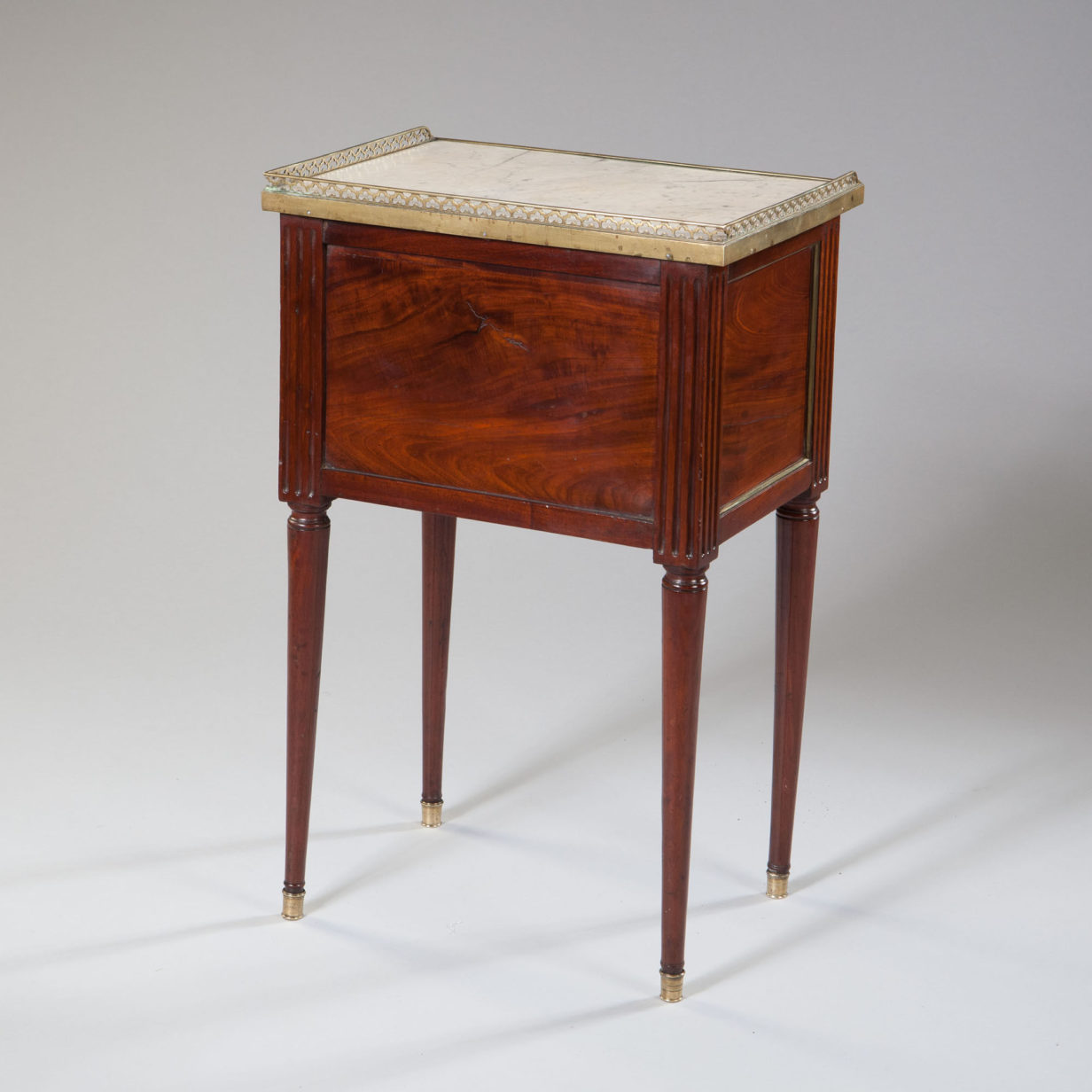A late 18th century louis xvi period mahogany bedside cabinet