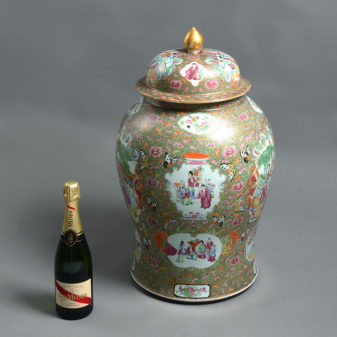 A large 19th century qing dynasty famille rose canton porcelain vase and cover