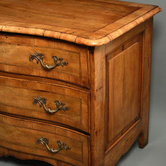 An 18th century louis xv period walnut serpentine chest of drawers or commode