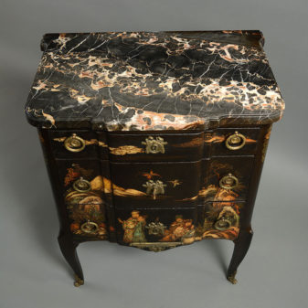 A 19th century lacquered commode or chest of drawers in the transitional manner