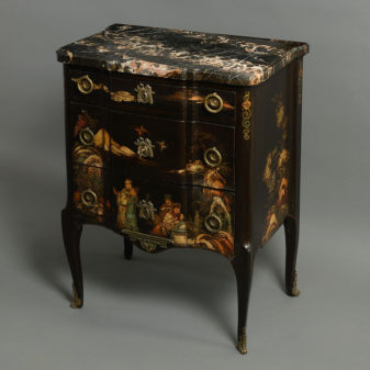 A 19th century lacquered commode or chest of drawers in the transitional manner