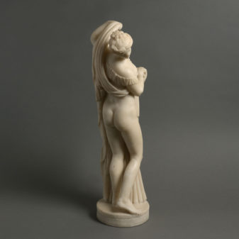 A 19th century marble table statue of venus bathing