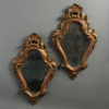 A pair of 19th century giltwood mirrors in the baroque manner