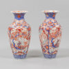 A large pair of 19th century imari vases