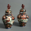 A pair of 19th century samson imari vases & covers