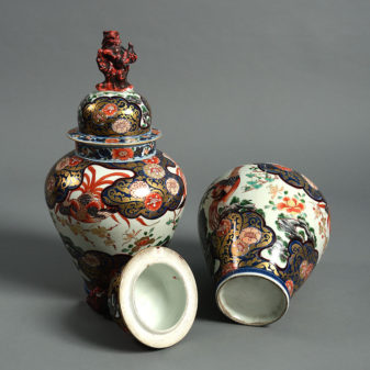 A pair of 19th century samson imari vases & covers