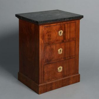 An early 19th century empire period bedside cabinet