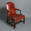 An 18th century george ii period mahogany gainsborough armchair