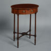 An 18th century george iii period sheraton mahogany occasional table