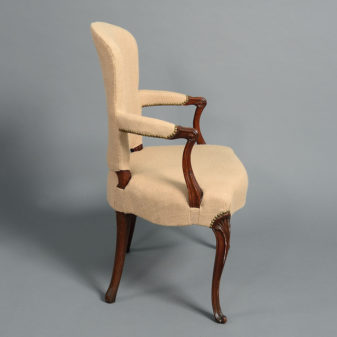 An 18th century french hepplewhite upholstered armchair