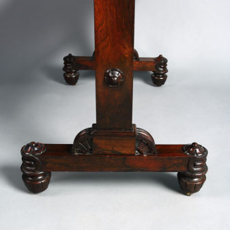 An early 19th century regency period rosewood writing table