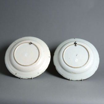 A pair of late 18th century polychrome faience chargers