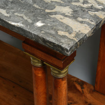 An early 19th century empire period walnut console table