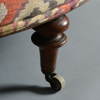 A 19th century victorian period ottoman with kilim upholstery