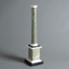 A 19th century tuscan marble column on square plinth