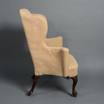 An early 18th century george i walnut wing armchair