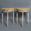 A pair of late 19th century adam style console tables