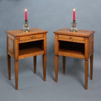A pair of 20th century directoire style bedside tables