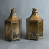 A pair of early 20th century patinated bronze hall lanterns