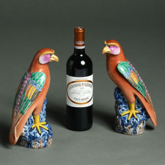A pair of 20th century porcelain falcons