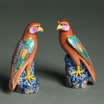 A pair of 20th century porcelain falcons