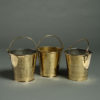 Three 19th century brass fire buckets