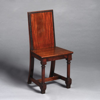 A set of four mahogany 19th century hall chairs