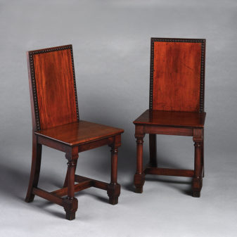 A set of four mahogany 19th century hall chairs