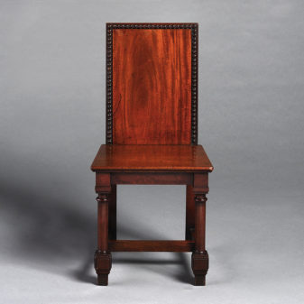 A set of four mahogany 19th century hall chairs