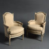 A pair of late 19th century louis xvi style painted bergeres