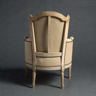 A pair of late 19th century louis xvi style painted bergeres