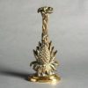 A late 19th century brass pineapple doorstop