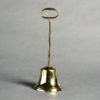 A mid-19th century brass doorstop