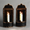 A pair of 19th century black tole wall lights