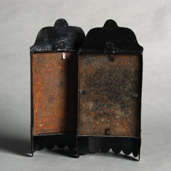 A pair of 19th century black tole wall lights