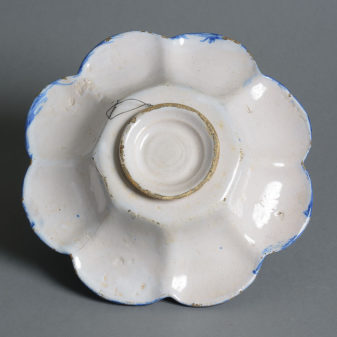 A late 17th century blue and white delft dish