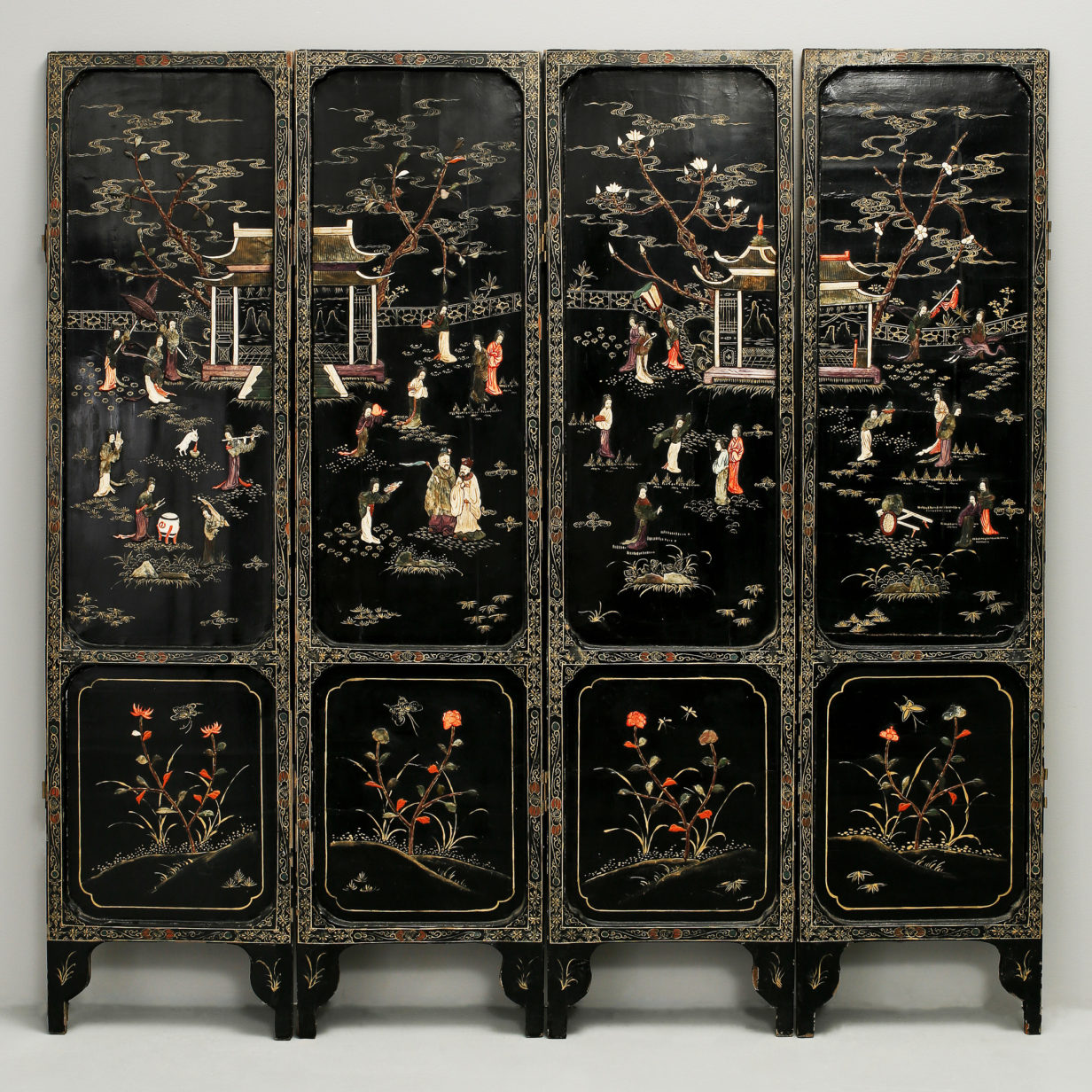 A late 19th century soapstone & lacquer four fold screen