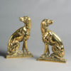 A pair of 19th century brass dog doorstops