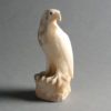 A late-19th century carved alabaster falcon