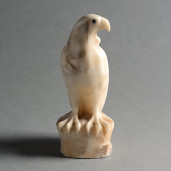 A late-19th century carved alabaster falcon