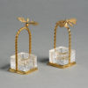 A pair of mid-20th century ormolu and cut glass salts