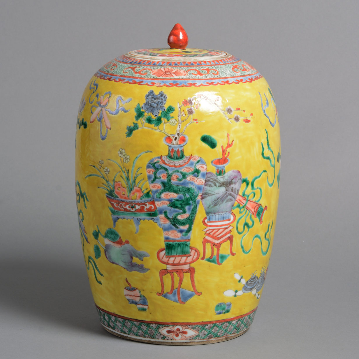 A 19th century qing dynasty yellow ground porcelain vase and cover