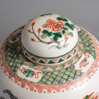 A 19th century qing dynasty famille verte jar and cover