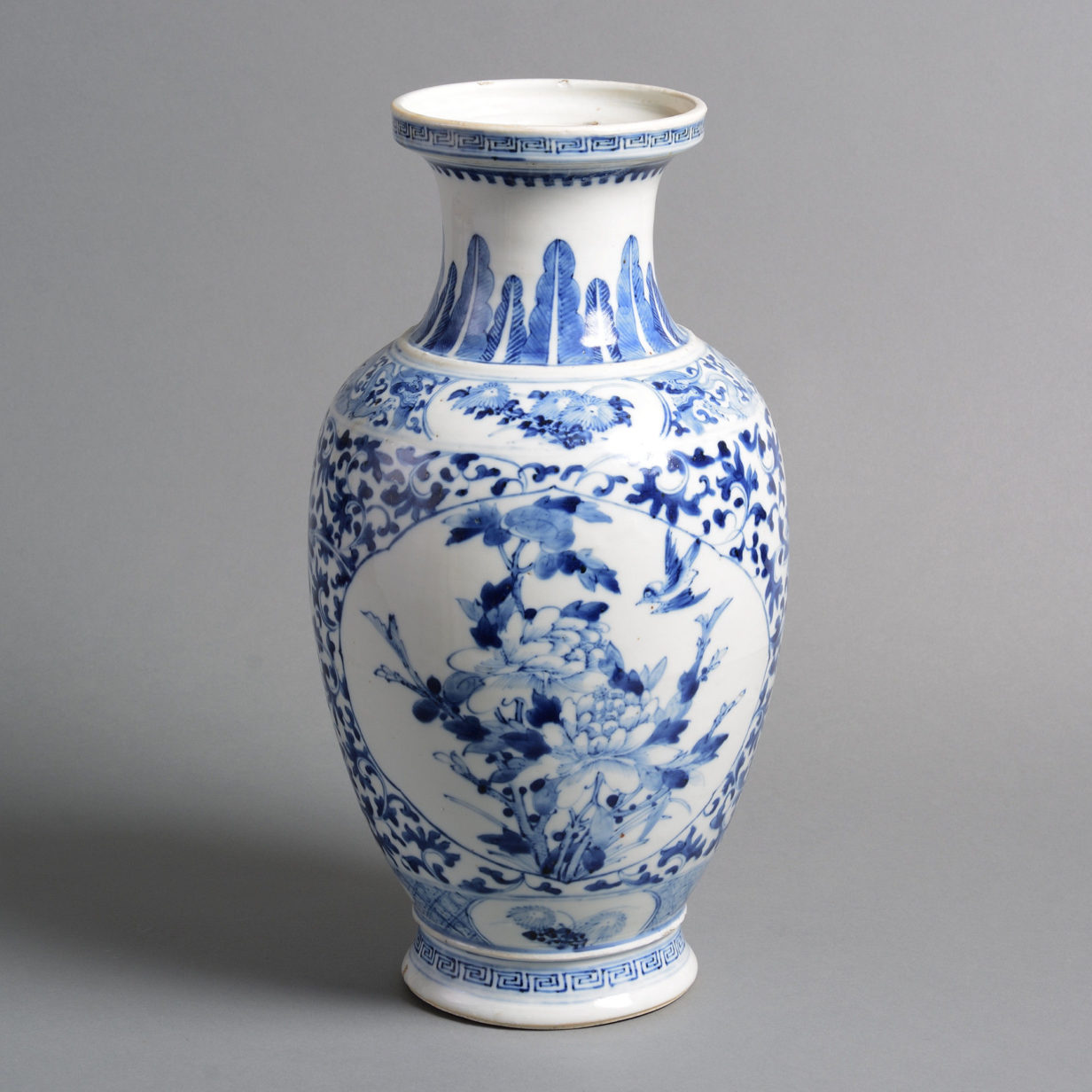 A 19th century qing dynasty blue and white porcelain vase