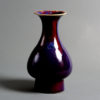 A 19th century qing dynasty pear shaped sang de boeuf vase
