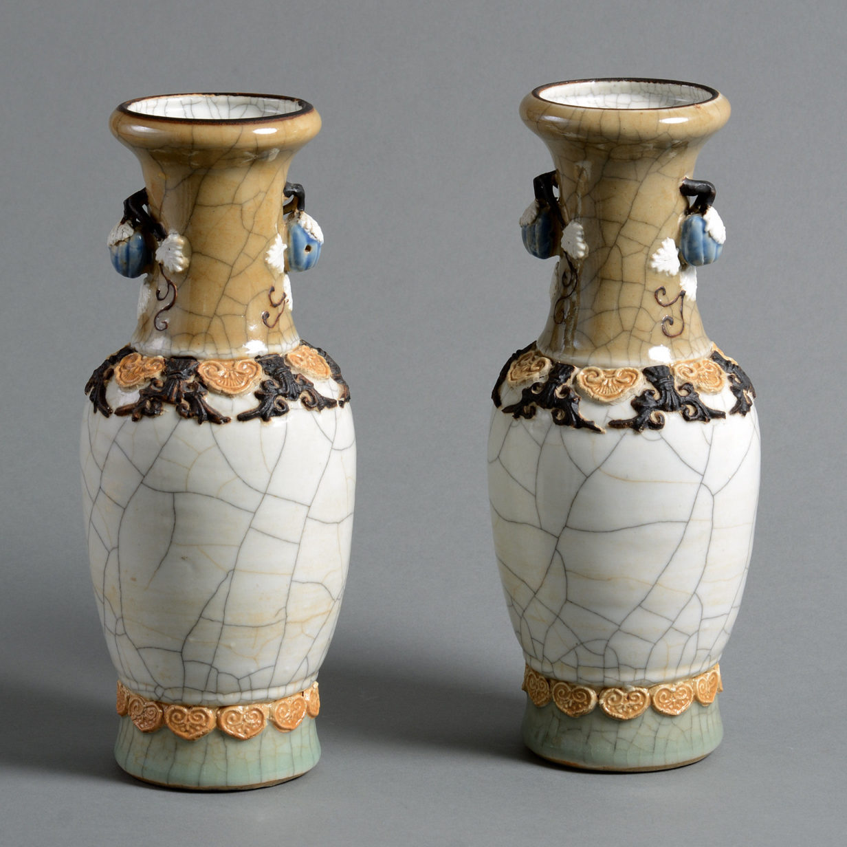 A pair of 19th century qing dynasty crackleware porcelain vases